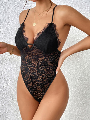Black lace bodysuit with scalloped trim and keyhole detail.