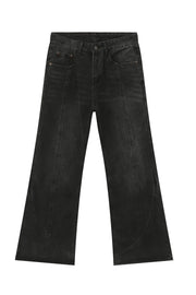 Black denim jeans with panel seams and a flare leg cut.
