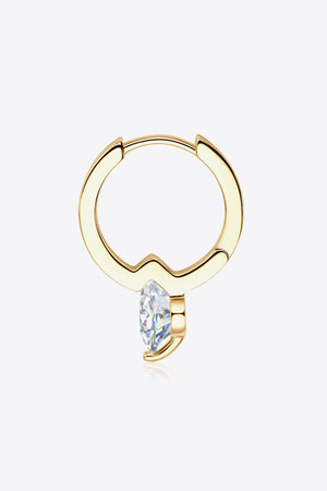 Gold huggie hoop earring with a marquise-cut clear gemstone drop.