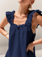 Navy ruffled square neck tank top with drawstring waist and side pockets.