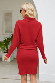 Red ribbed knit midi dress with a turtleneck and long sleeves.