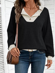 Chic ribbed two-tone maternity shirt in black and beige with button detail.