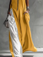 Chic two-tone mustard and white maxi dress with pockets and a relaxed fit.