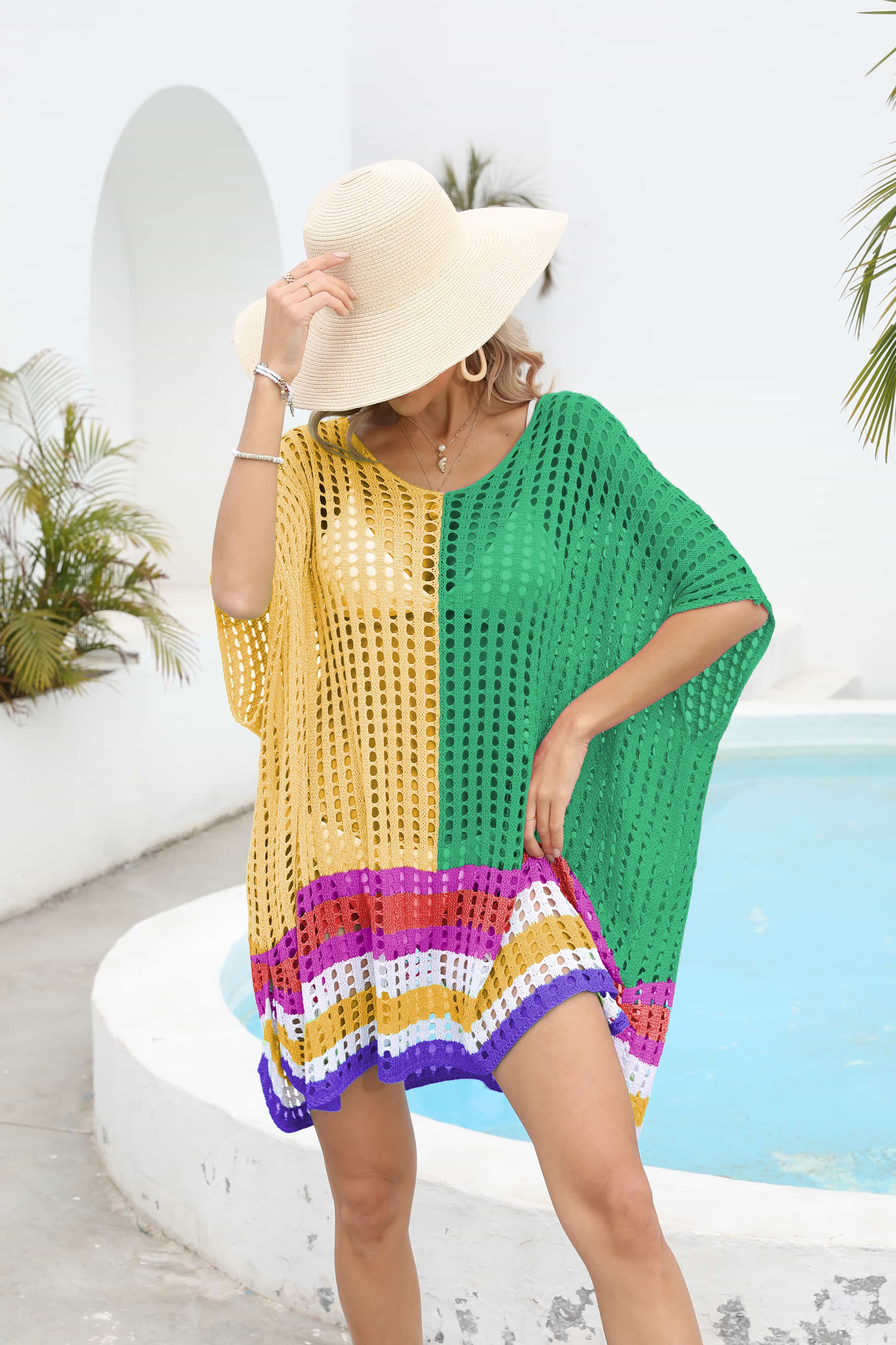 Yellow and green mesh cover-up with scoop neck, half sleeves, and striped hem.