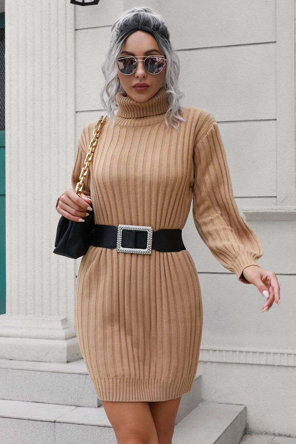 Camel ribbed turtleneck mini dress with long sleeves and a jeweled buckle belt.