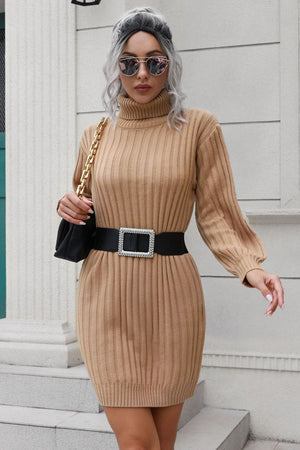 Camel ribbed turtleneck mini dress with long sleeves and a jeweled buckle belt.