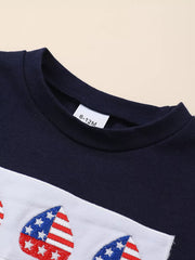 Navy baby set with embroidered American flag hearts on a white stripe.
