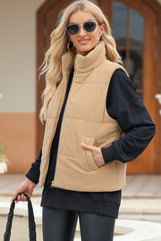 Tan corduroy padded funnel neck vest with zip front and pockets