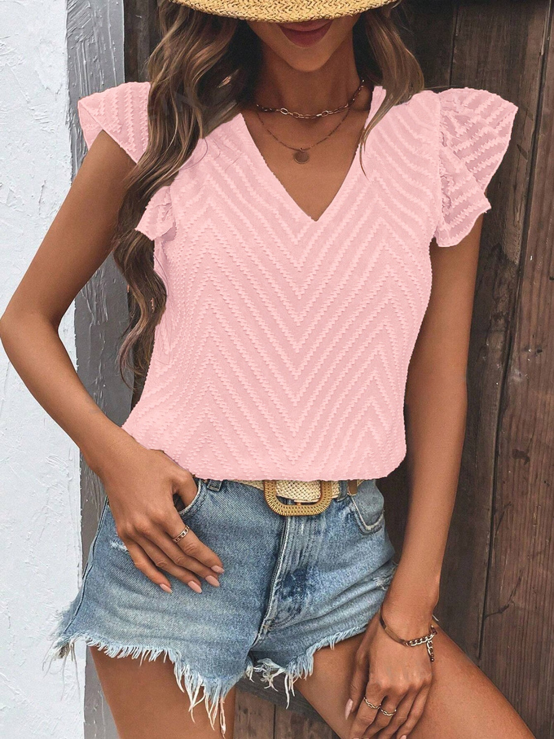 Blush pink textured chevron v-neck blouse with flutter sleeves