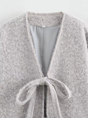 Silver gray textured knit tie-front cardigan with a V-neck and cozy fit.