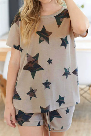 Camo star print pajama set with drawstring shorts and short sleeve top.