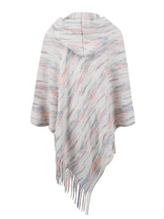 Hooded mélange cape in ivory with colorful stripes and fringe detail.