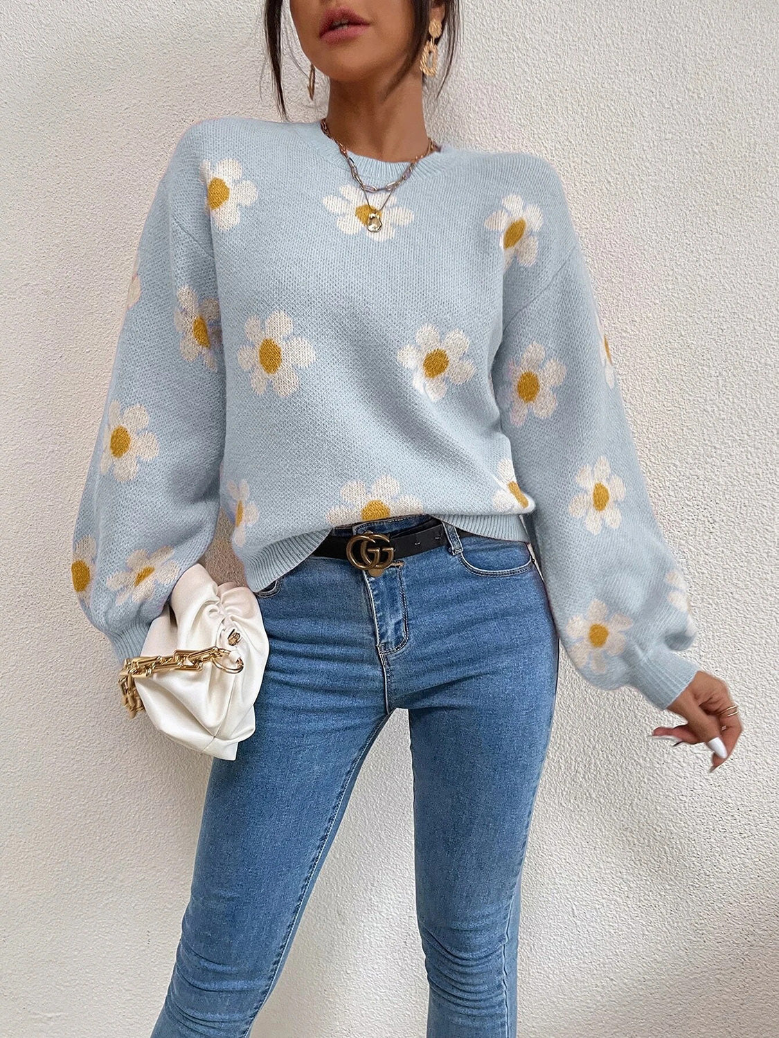 Daisy Field Puff Sleeve Knit sweater in Misty Blue with allover white daisy print and balloon sleeves.