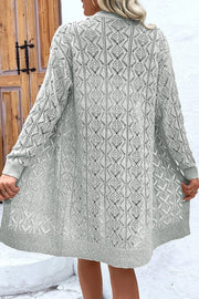 Gray diamond knit duster cardigan with open front and long sleeves.