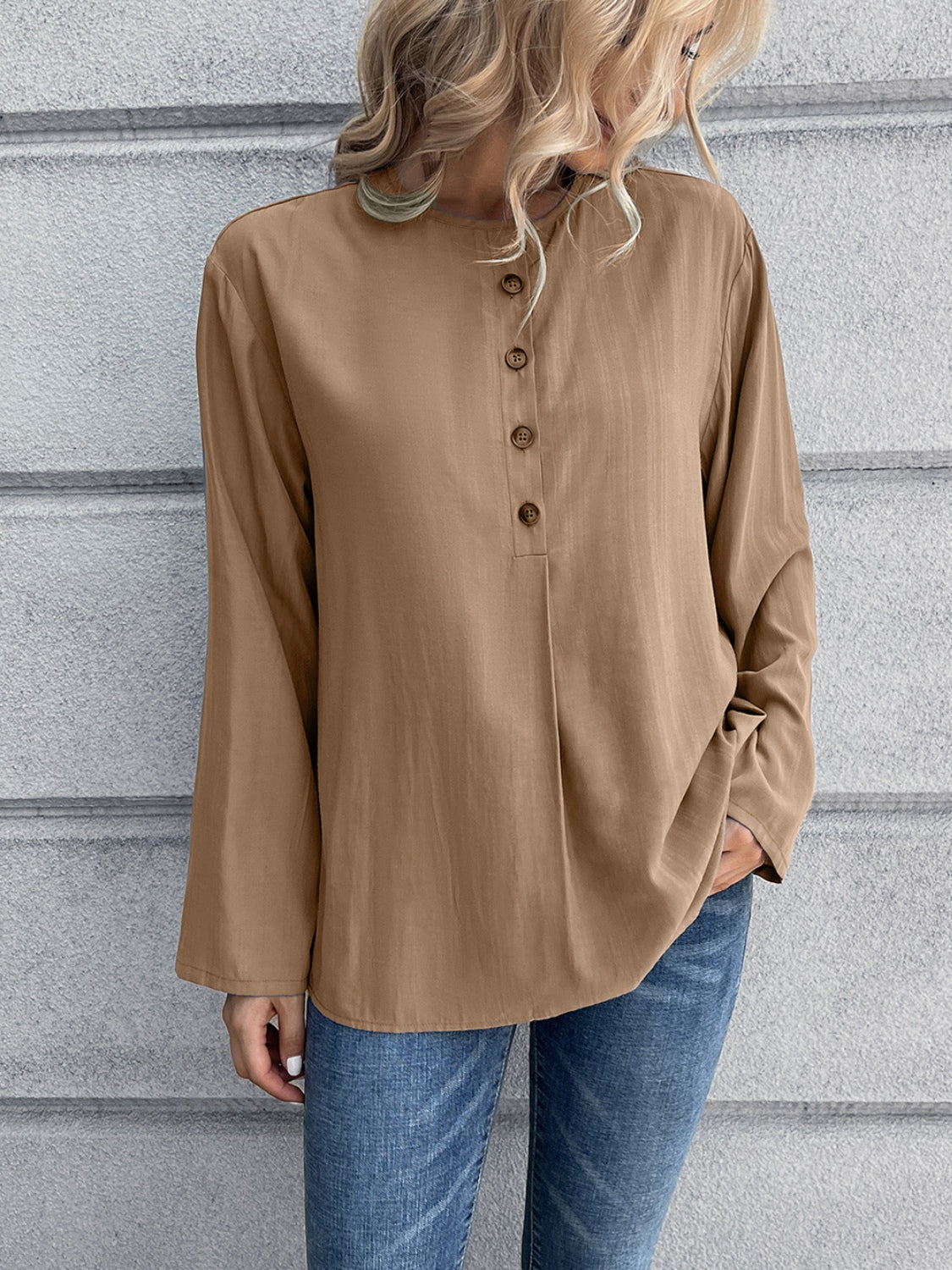 Camel mandarin collar button-down blouse with long sleeves and a relaxed fit.