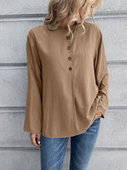 Camel mandarin collar button-down blouse with long sleeves and a relaxed fit.