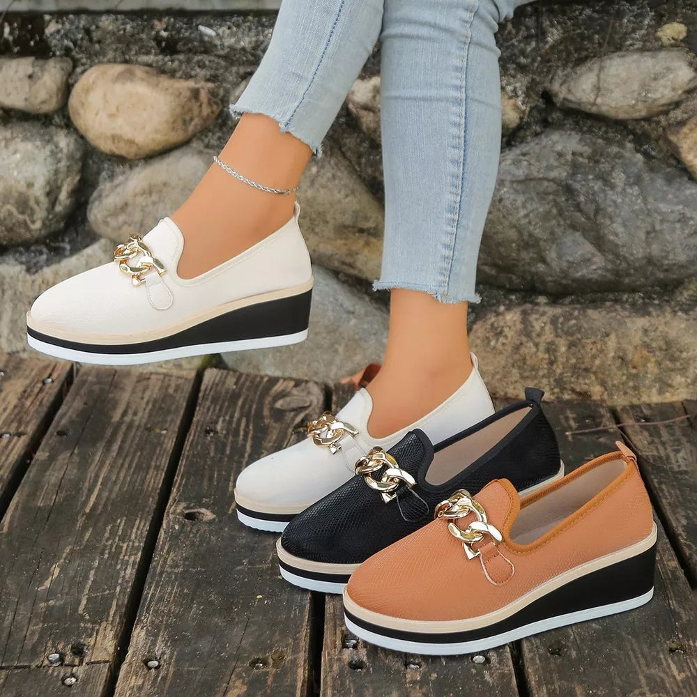 Chain decor wedge loafers in black, brown, and beige with comfortable casual styling.