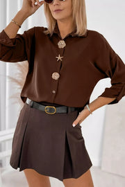 95% polyester, 5% elastane Care instructions: Machine wash cold button-up shirt in Dark Brown with relaxed silhouette