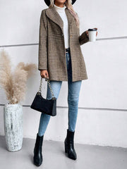 Brown plaid tailored overcoat with single button closure, notched lapel, and a relaxed fit.