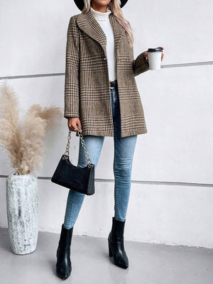 Brown plaid tailored overcoat with single button closure, notched lapel, and a relaxed fit.