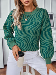 Dark green wavy knit crewneck sweater with a bold abstract pattern.