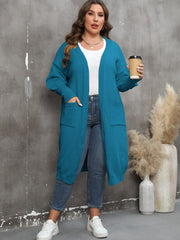 Teal oversized knit duster cardigan with patch pockets, 100% polyester.