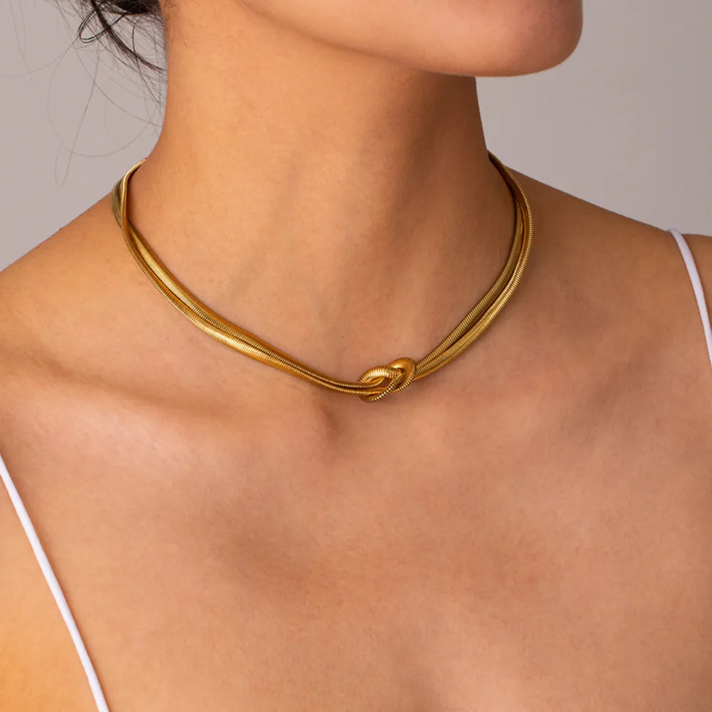 Gold herringbone knot choker necklace with intertwined chains