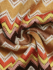 Zigzag knit two-piece set in warm tones with open crochet detail.