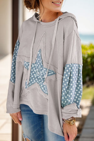 Gray floral star patchwork hoodie with raw hem details and drawstring hood.