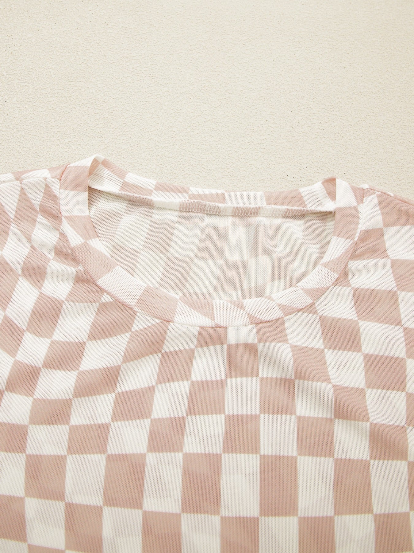 Checkered mesh crew neck t-shirt in beige and white with a sheer finish.