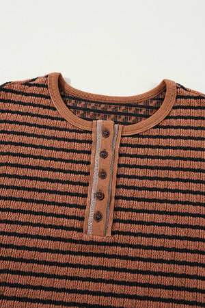 Textured henley knit top in caramel with black stripes and a button placket.