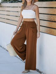 Caramel palazzo trousers with elastic waist and pockets, wide leg.