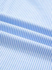Blue and white striped button-down shirt fabric detail