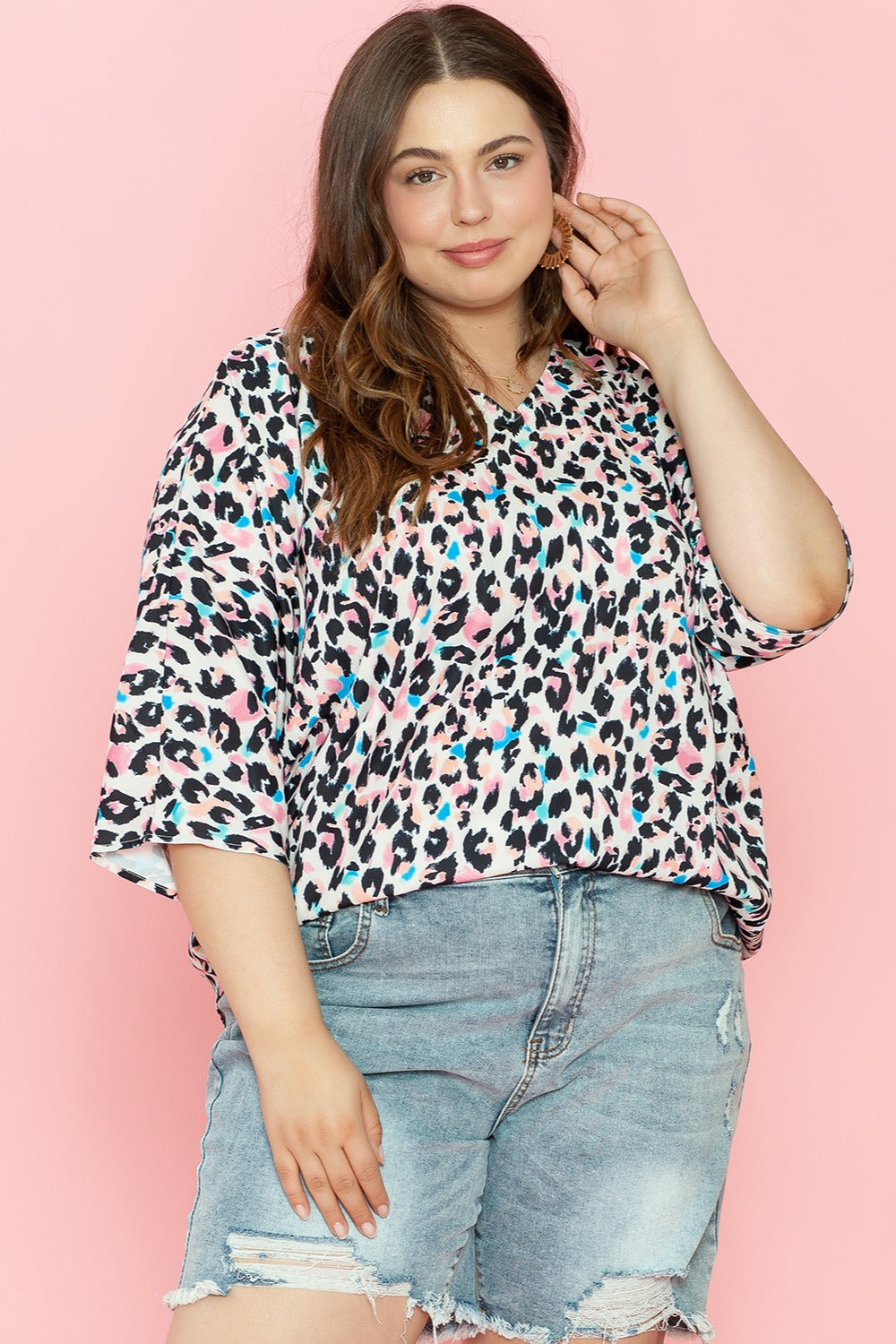 Color Pop Leopard Print Batwing Top with V-neck and 3/4 sleeves.
