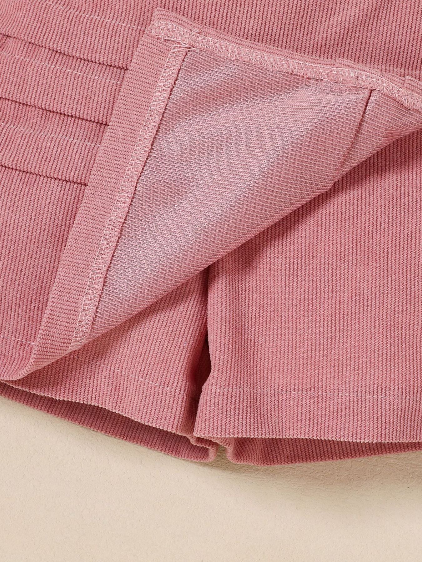 Toddler pink corduroy skort with pleated detail and smooth lining