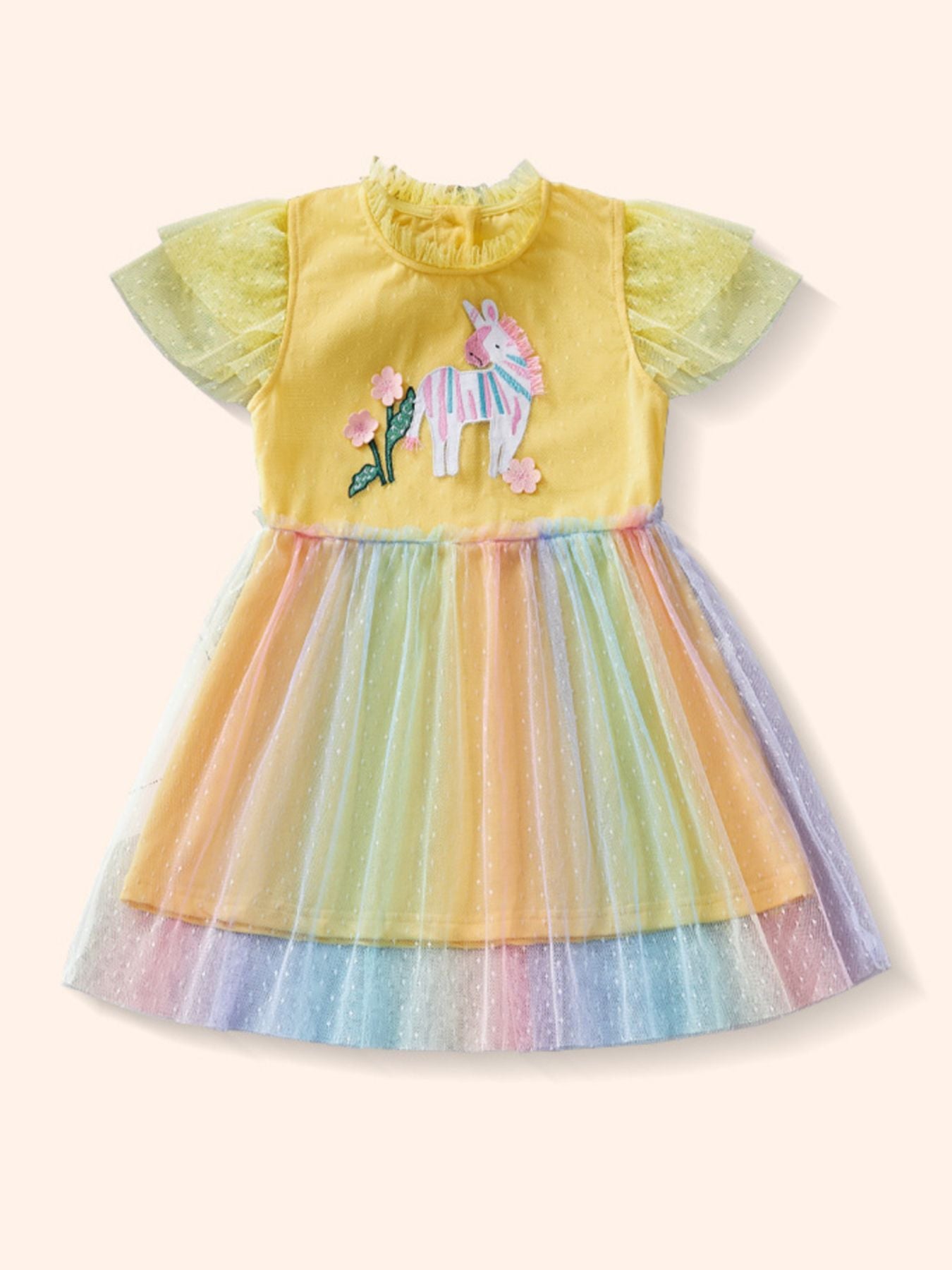 Yellow toddler dress with unicorn applique and rainbow tulle skirt.