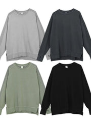 Oversized sweatshirt in dark gray, sage, black, and gray with raw-edge seams and crew neckline.