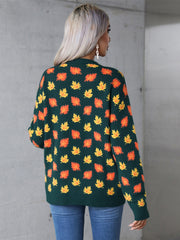 Dark green acrylic knit crewneck sweater with an all-over autumnal leaf motif.