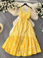 Yellow lace-embroidered tiered cami midi dress with cutout details.