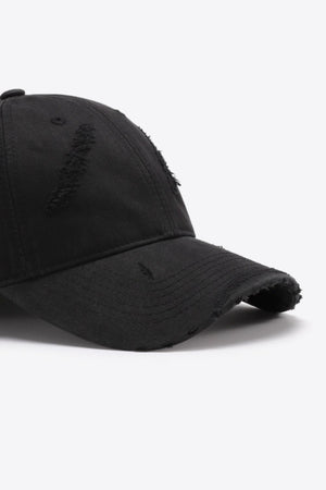 Black distressed baseball cap with frayed details and adjustable fit.