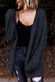 Dark gray open-knit pocket cardigan with textured acrylic fabric and a relaxed fit.