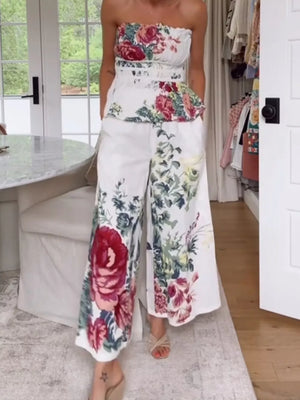 Floral print strapless peplum top and wide-leg pants set in white polyester.