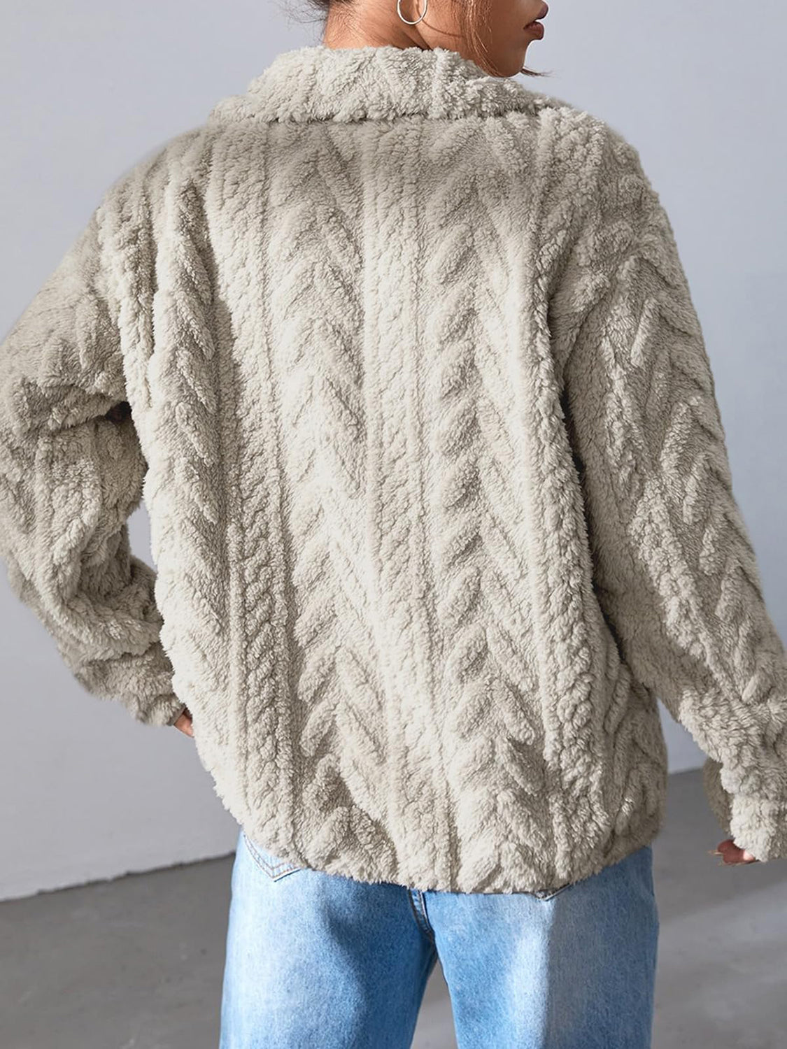 Textured chevron fleece zip jacket in khaki with a collared neckline and long sleeves.