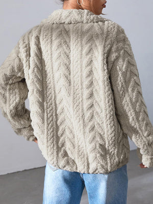 Textured chevron fleece zip jacket in khaki with a collared neckline and long sleeves.