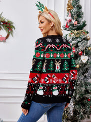 Festive Fair Isle button-up cardigan in black with Christmas motifs like snowmen and reindeer.