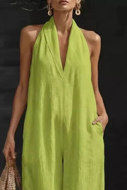 Chic halter-neck pocketed jumpsuit in white, lime, black, burgundy, or light blue.