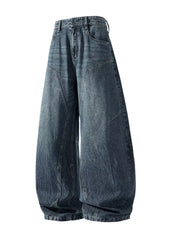 Refined wide-leg jeans in Vintage Blue denim with geometric panel detailing and a relaxed fit.