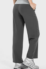 Charcoal relaxed drape drawstring palazzo pants with pockets.