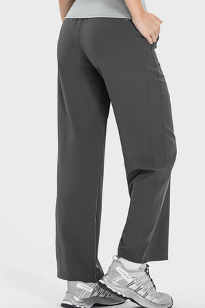 Charcoal relaxed drape drawstring palazzo pants with pockets.