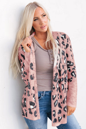 Blush leopard open-front knit cardigan with long sleeves.